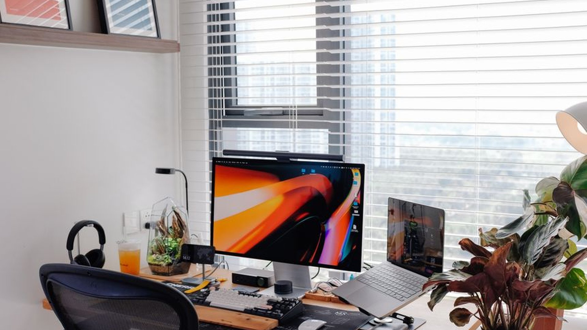 remote work desk setup ergonomic chair laptop moni