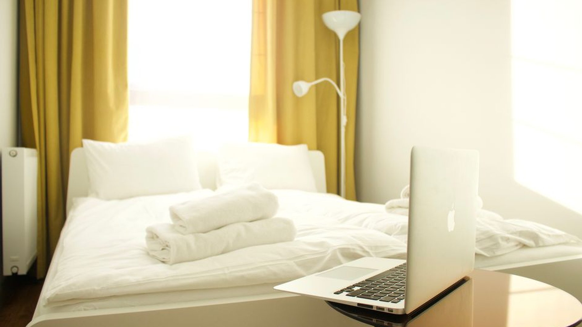 home office bedroom natural light queen bed window