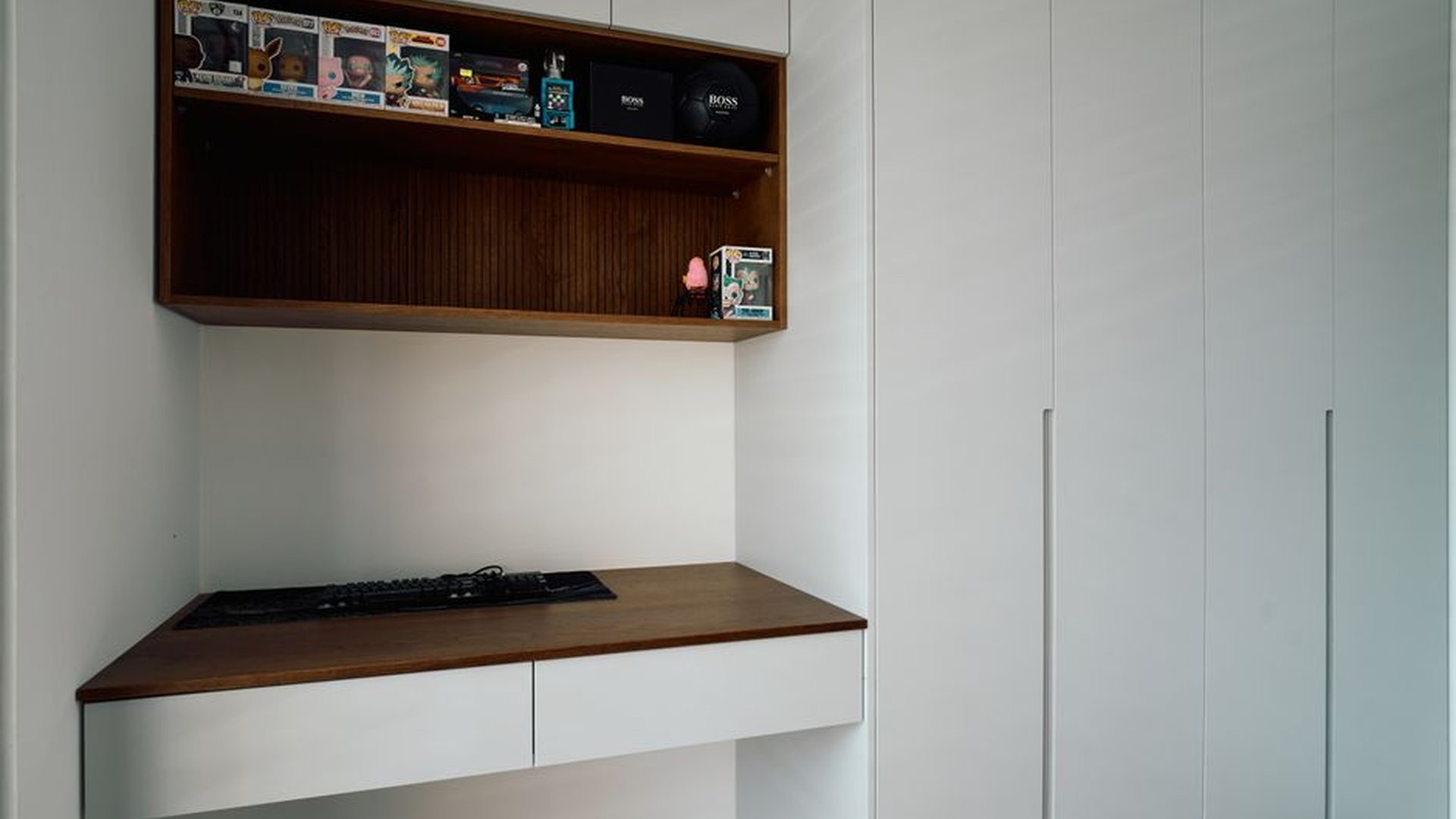 office desk with built-in shelves and hidden stora
